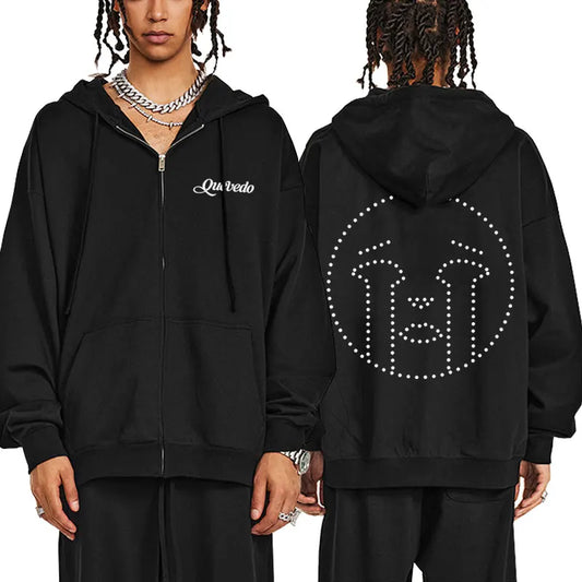 Black zip up hoodie featuring a white embroidered Rapper Quevedo logo on the front and rhinestone design on the back
