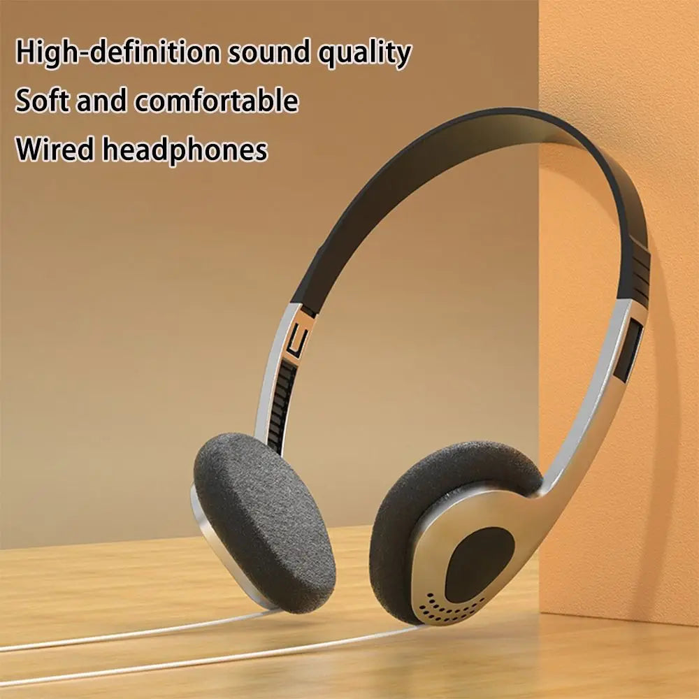 Silver and black retro wired headphones with soft padded earcups designed for hip hop trends and walkman earphone personality