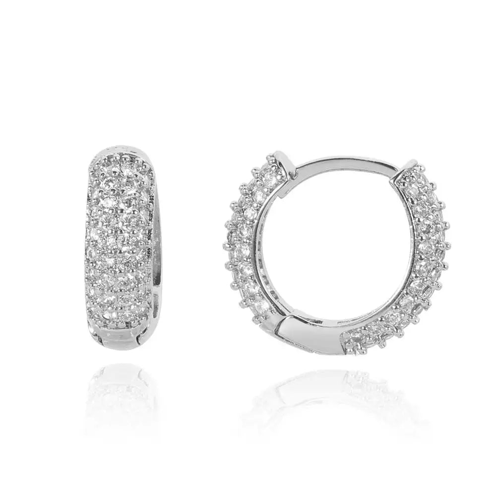 Silver fine jewelry earrings featuring hip hop geometric huggie hoops with dense pavé clear crystal zirconia stones