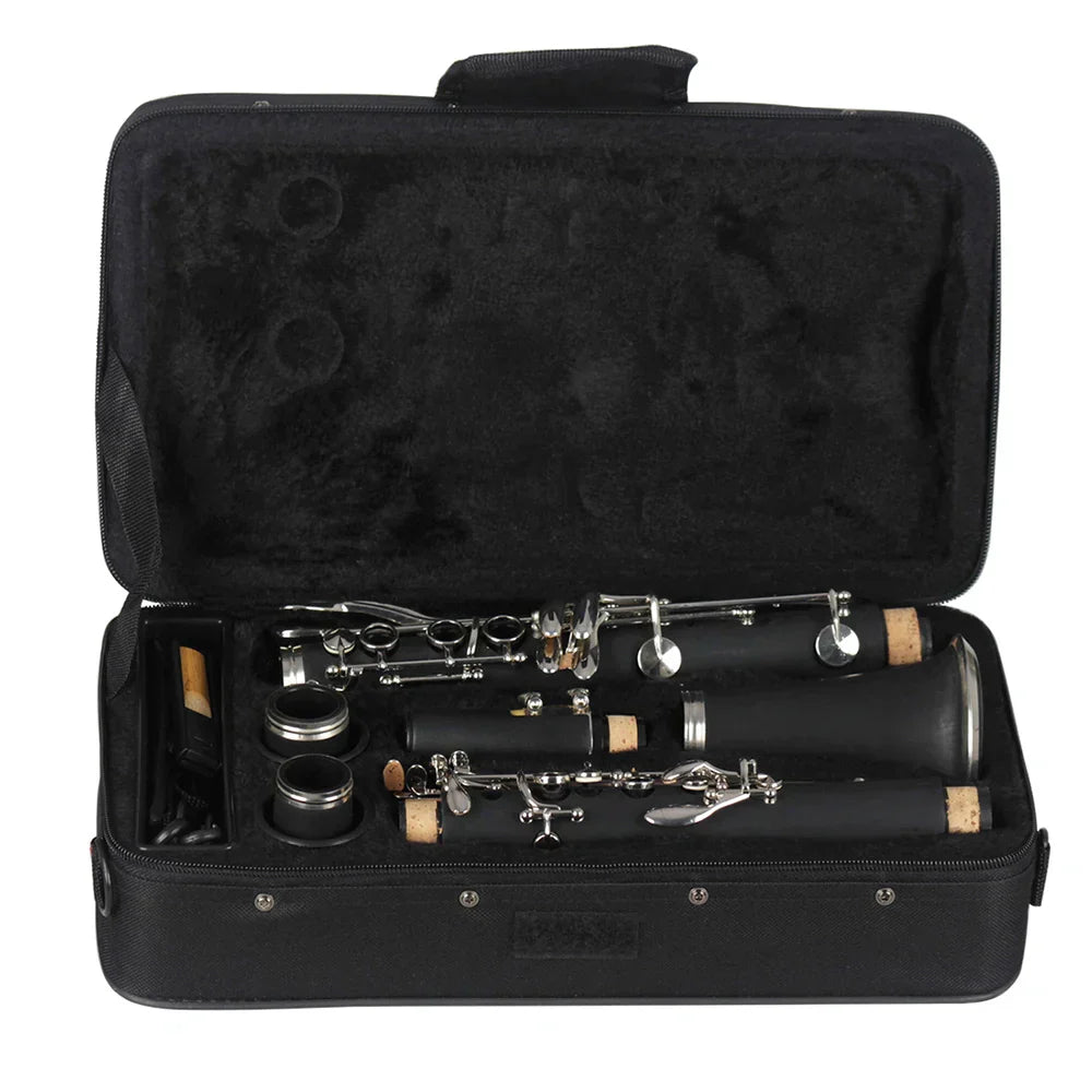 Black clarinet with silver keys and cork joints in a case for slade bb clarinet keys bakelite wooden professional use