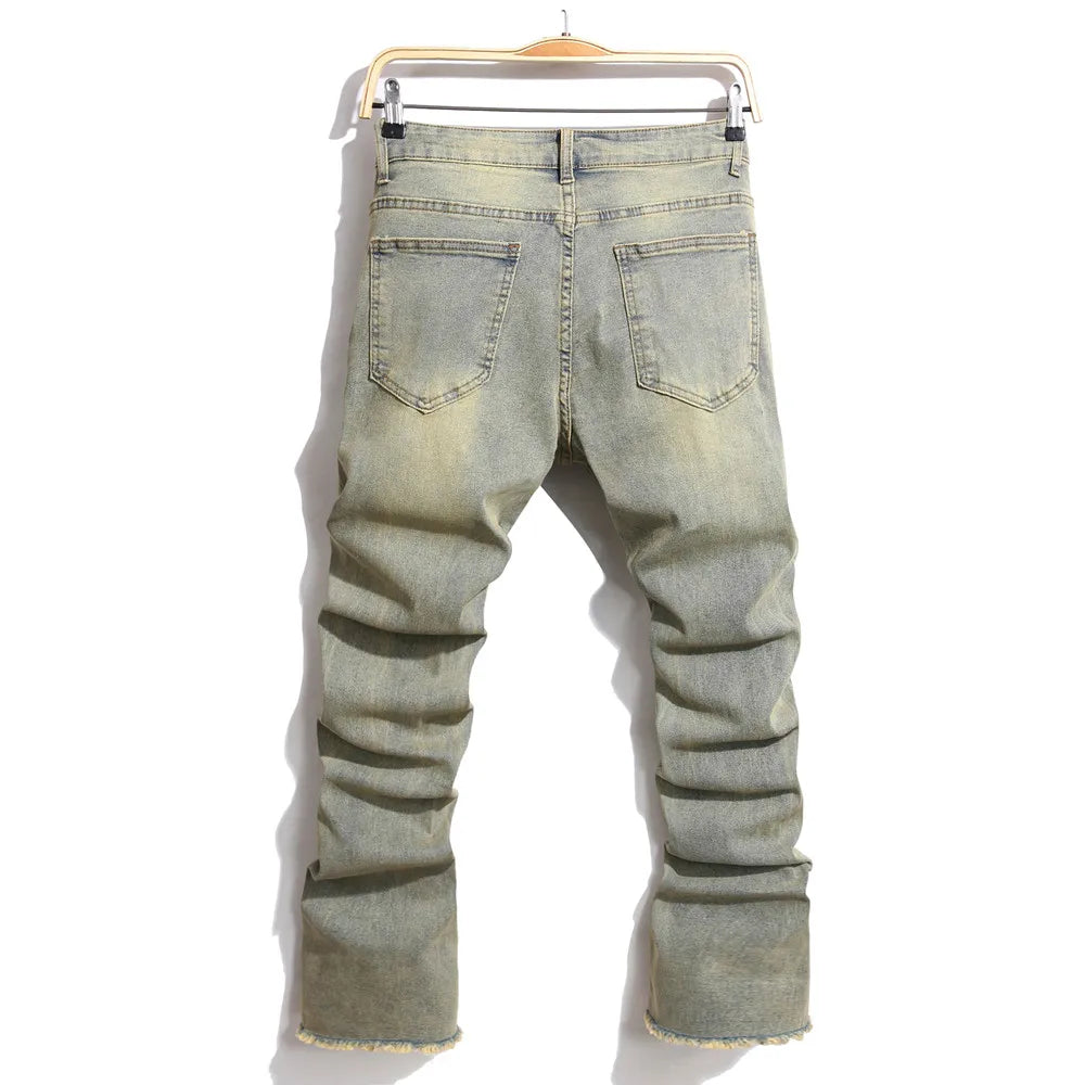 Light-wash denim streetwear retro style spliced slim jeans with hip hop holes and frayed cuffs for men