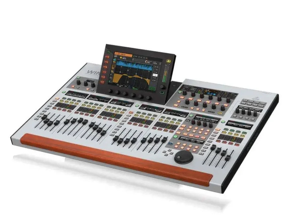 Silver and black behringer wing 48-channel digital mixer with touchscreen faders knobs for professional type beat music control
