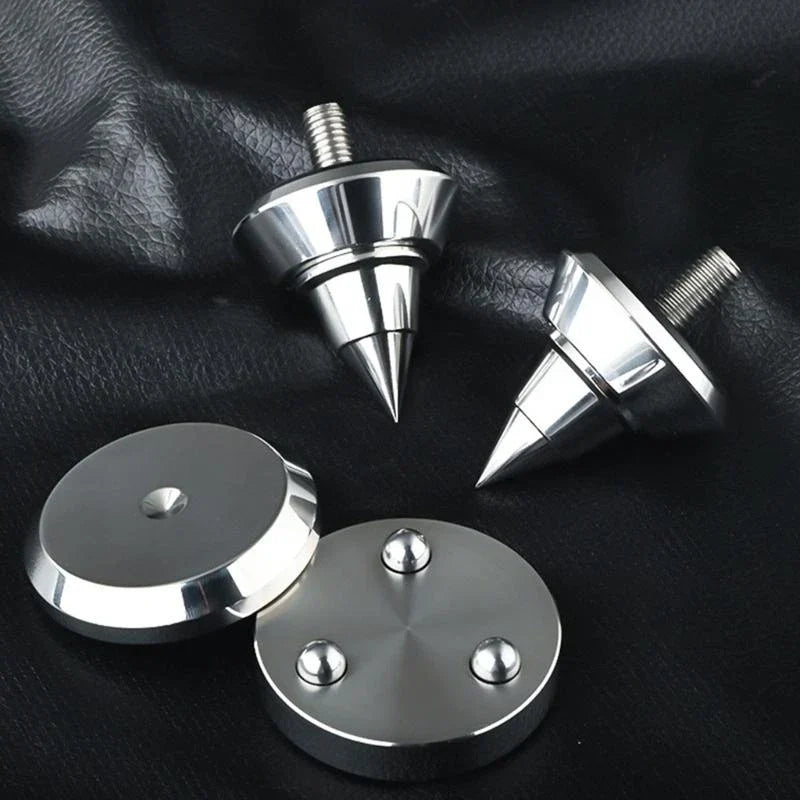 Shiny chrome-finished universal speaker isolation stand feet with threaded bases and pointed tips for shockproof foot mat use