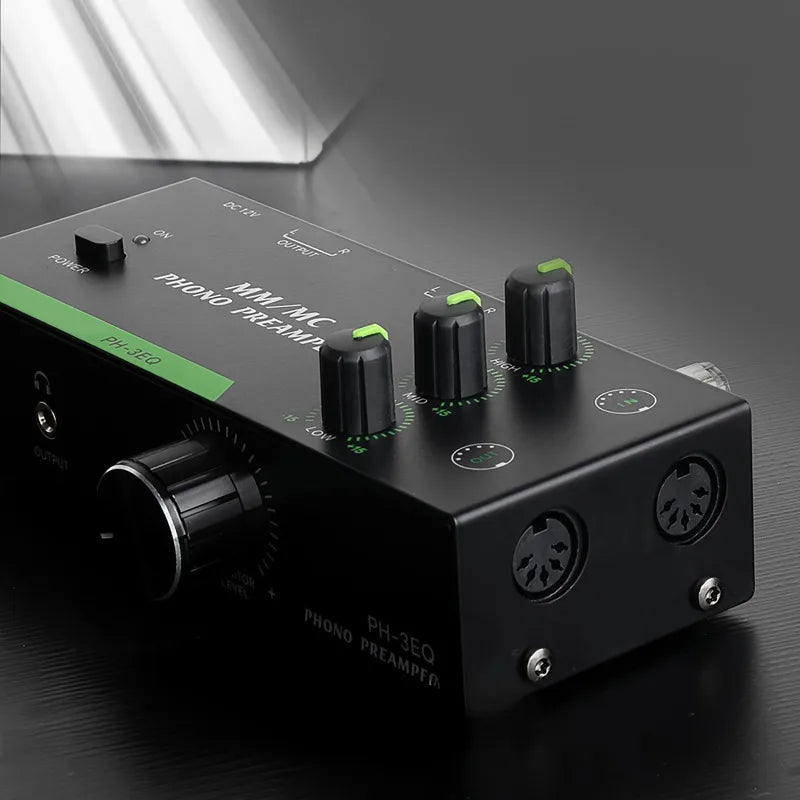 Black rectangular versatile turntable amplifier with green accent and multiple knobs for professional mm mcs vinyls record player use