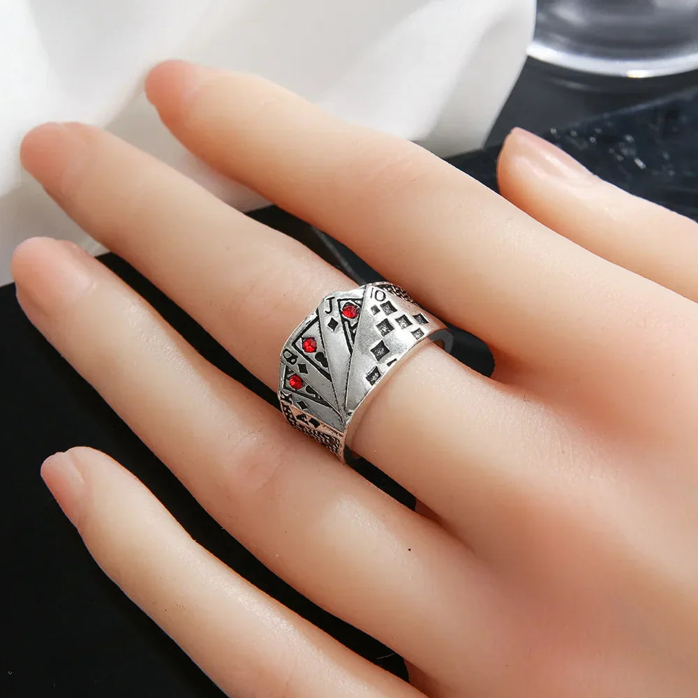 Silver vintage metal opening poker ring with red gemstone accents and intricate engravings hip hop adjustable design