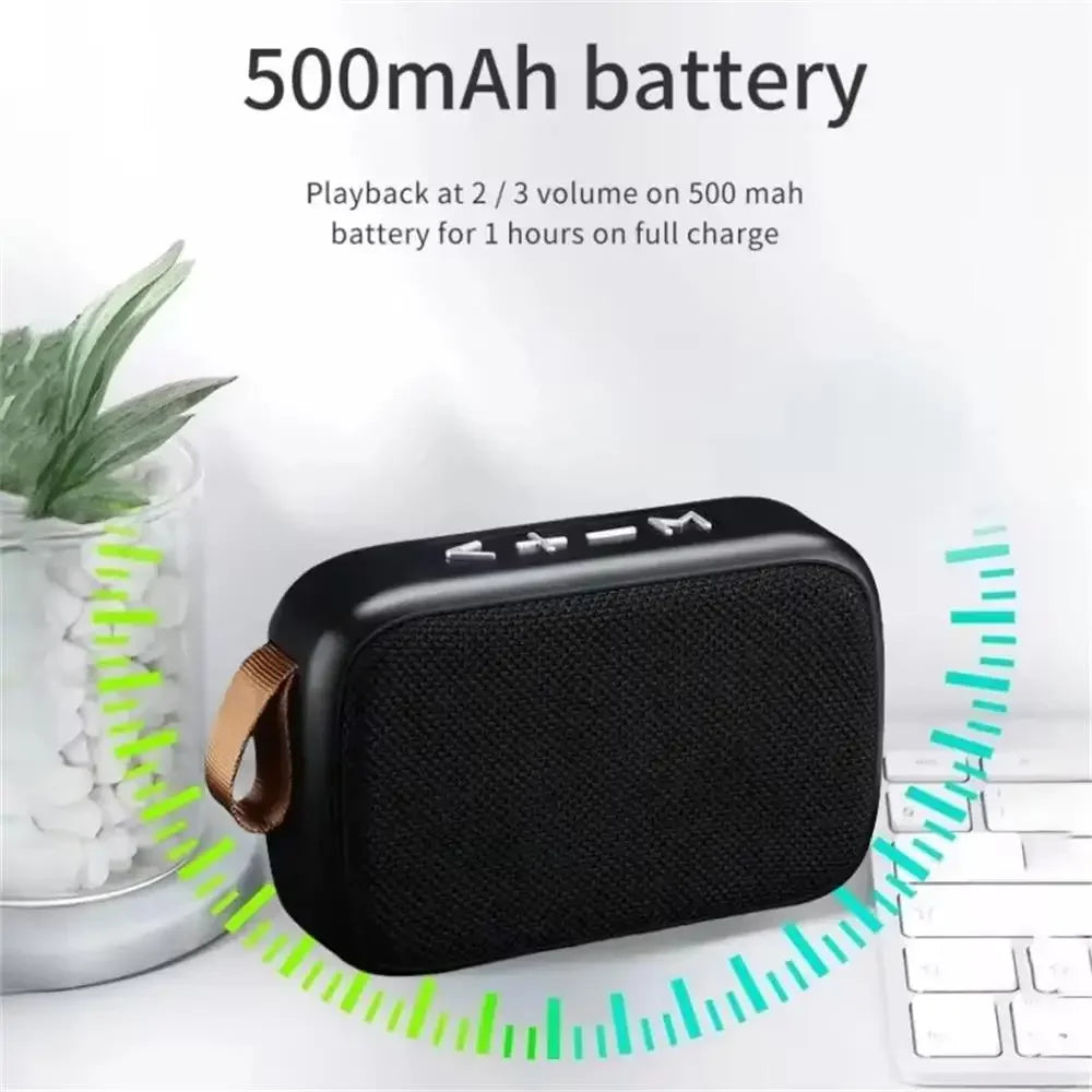 Black wireless mini bluetooth speaker with textured fabric finish and tan leather strap designed for outdoor use