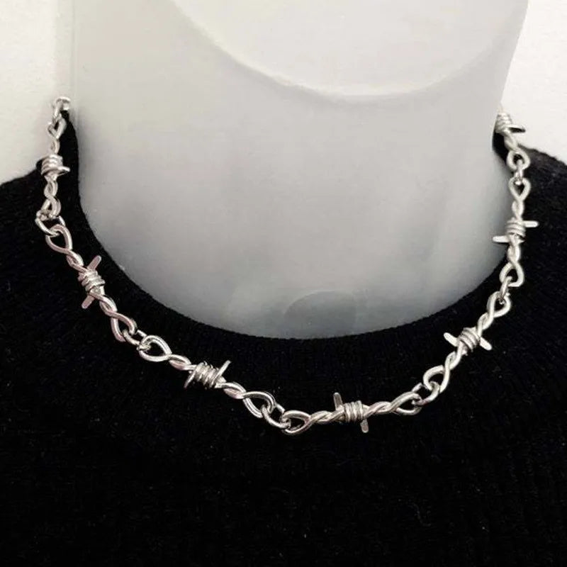 Silver iron unisex choker necklace with twisted chain links and sharp gothic punk barbed thorns chain choker details