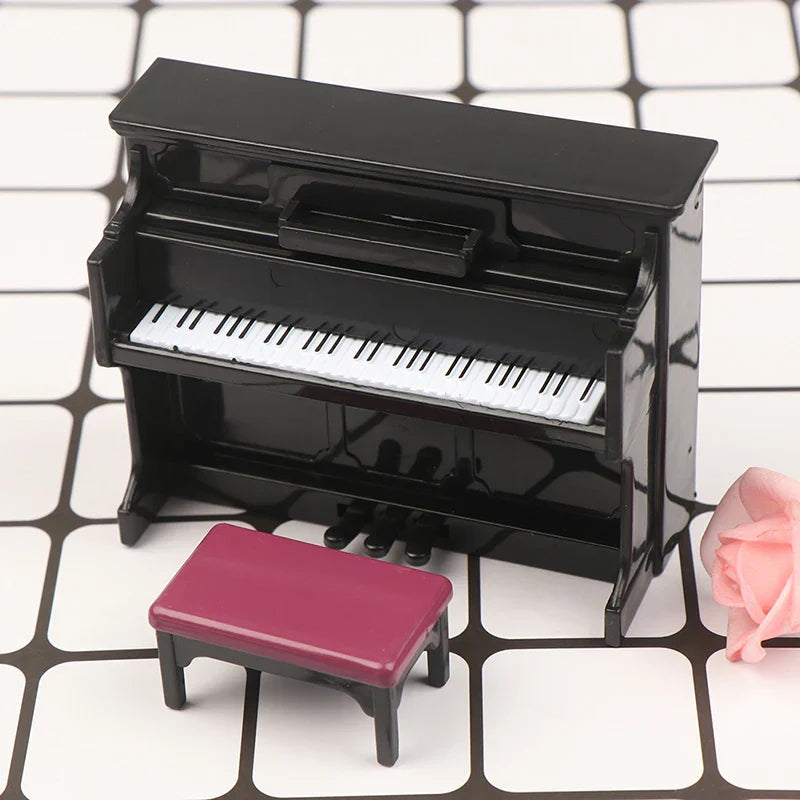 Black glossy wooden grand piano with white and black keys and magenta cushioned stool dollhouse miniature accessory musical instrument model