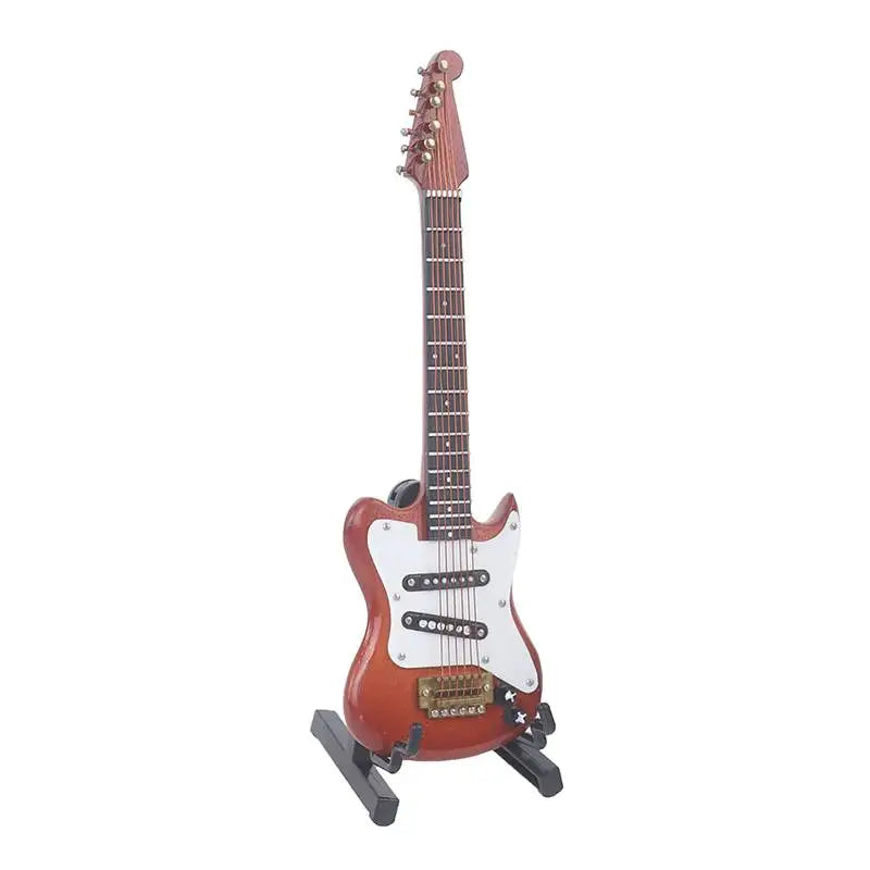 Red and white miniature electric guitar with black pickups and gold hardware in 1:12 dollhouse miniature furniture playset
