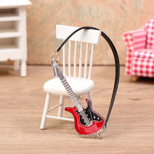 Red and black electric guitar-shaped keychain with silver detailing for 1:12 dollhouse miniature furniture playset decor