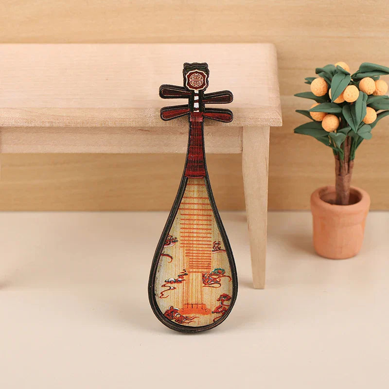 Decorative miniature lute with black frame and red gold dragon design in 1 12 dollhouse miniature furniture playset model living room
