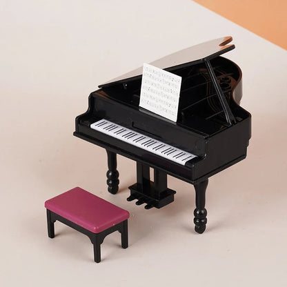 Black miniature piano with white and black keys and pink stool in 1 12 dollhouse miniature piano set decor