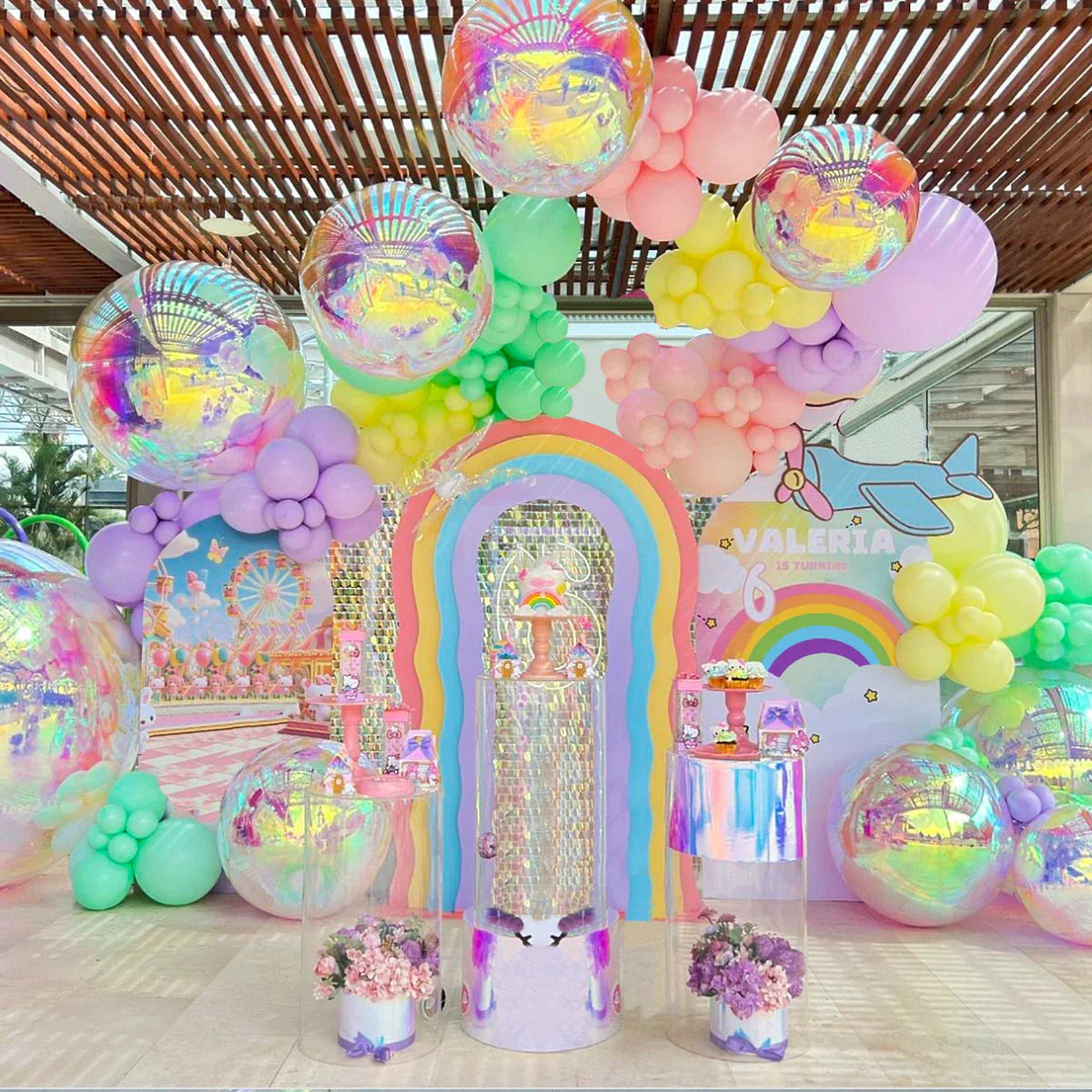 Pastel rainbow archway with iridescent color 4d holographic balloons for birthday party music and wedding party supplies
