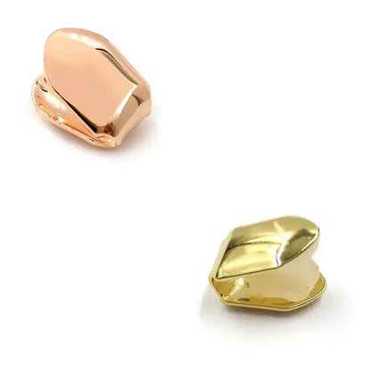 Two shiny gold plated small single tooth caps with smooth polished finish hip hop grills for rapper party accessories