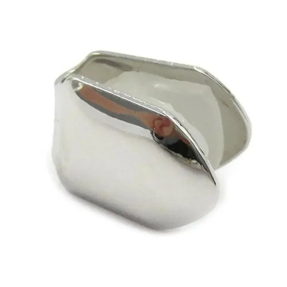 Shiny silver metal single tooth caps with smooth reflective surface and rounded edges for hip hop grills use