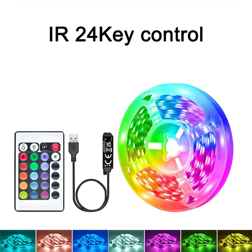 A vibrant flexible rgb led strip light coiled with rainbow colors for room tv backlight usb 5v music sync and 44key remote control