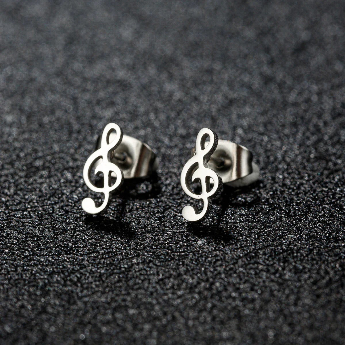 Silver-toned stainless steel mini music earrings with charm musical note design and small ear studs for women gift