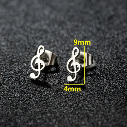 Silver stainless steel mini music earrings featuring a sleek charm musical note design as small ear studs for women