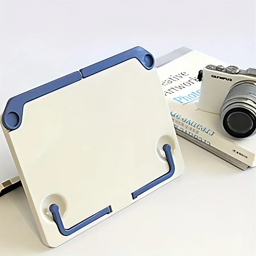A sleek white and blue lightweight adjustable portable tablet stand with durable plastic construction for music score drawing and more