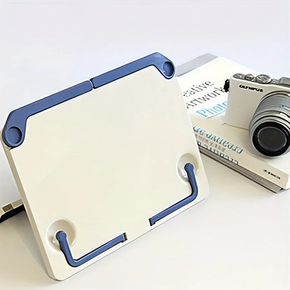 A sleek white and blue lightweight adjustable portable tablet stand with durable plastic construction for music score drawing and more