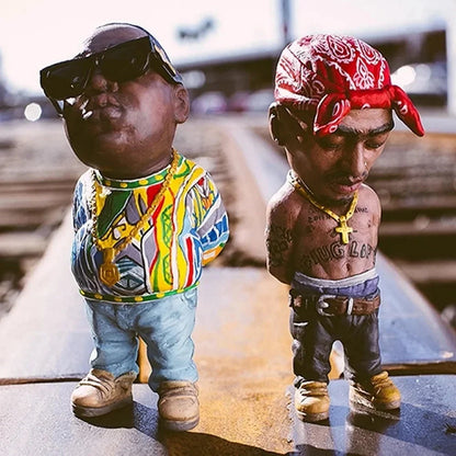 Two stylized bobblehead hip hop legend commemorative resin ornaments in detailed streetwear for home decoration