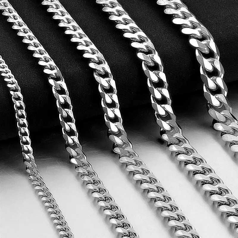 Silver-toned stainless steel overbearing cuban chain party necklace with polished reflective curb links for men and women