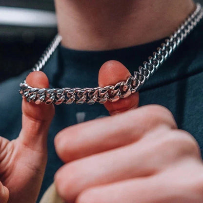 A thick silver-toned stainless steel overbearing cuban chain party necklace for men and women