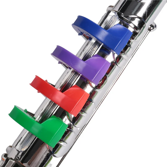 A shiny chrome musical instruments brass flute with colorful blue purple red and green plastic key covers wind instrumentabht