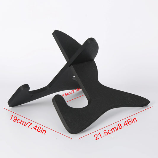 Black plastic 1 piece guitar stand with sleek minimalist design for musical instrument protection and convenient storage