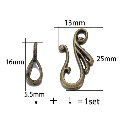 Antique brass-colored metal clasps with teardrop and ornate s-curve designs for jewelry making antique bronze silver musical note hook toggle clasp