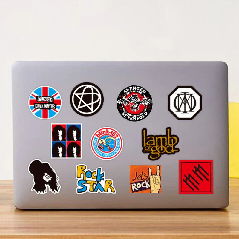 Silver laptop decorated with colorful 100pcs classic rock graffiti music band stickers for laptop phone motorcycle use