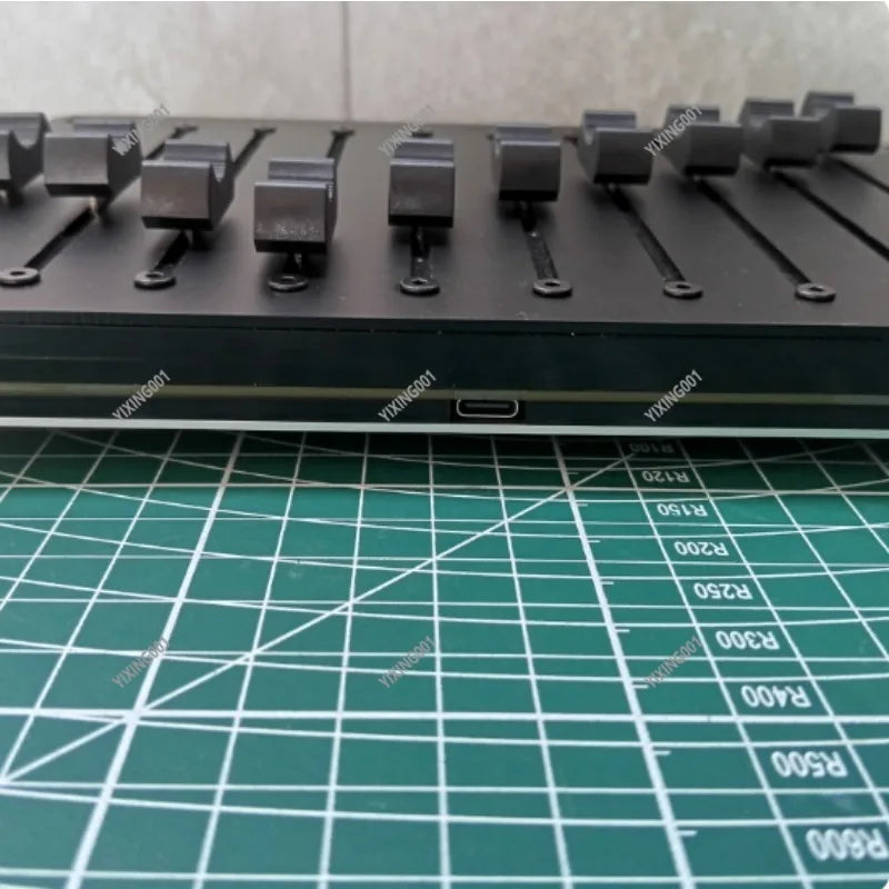 Black 10-channel usb midi fader controller with multiple faders usb port and custom cc software for type beat music