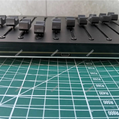 Black 10-channel usb midi fader controller with multiple faders usb port and custom cc software for type beat music