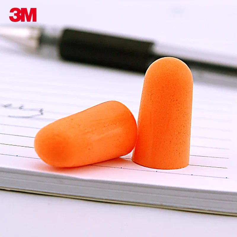 Bright orange soft foam 3m earplugs with tapered design for noise reduction and industrial machinery protection
