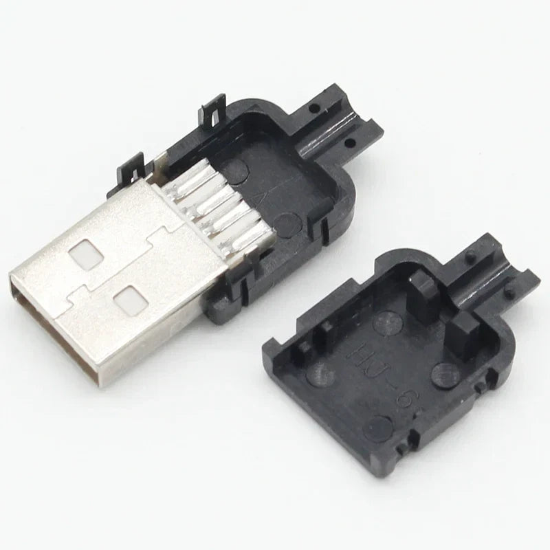 Black plastic usb 2.0 connector housing with silver metallic contacts and molded insert for data connection assembly