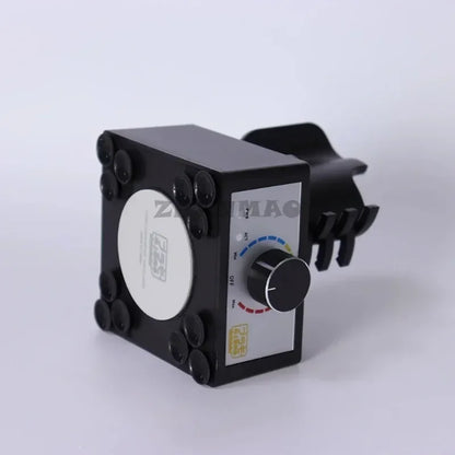 Black rectangular magnetic control unit with circular dial and suction cups for adjustable speed mini eddy current mixer hobby model making