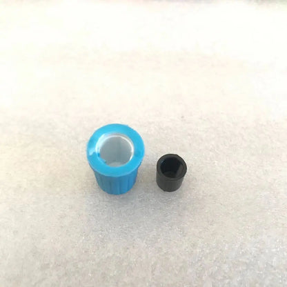 Blue and black plastic cylindrical caps with ribbed exteriors for pioneer djm750 mixer ddj-sb and aero djm-t1 controllers