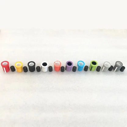 A row of colorful plastic and metal high and low eq gain knob caps for pioneer djm750 mixer ddj-sb and aero djm-t1 controllers