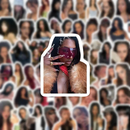 A woman wearing bold pink sunglasses and a fur-trimmed coat showcasing 100pcs set kpop katseye stickers for megan fans gift