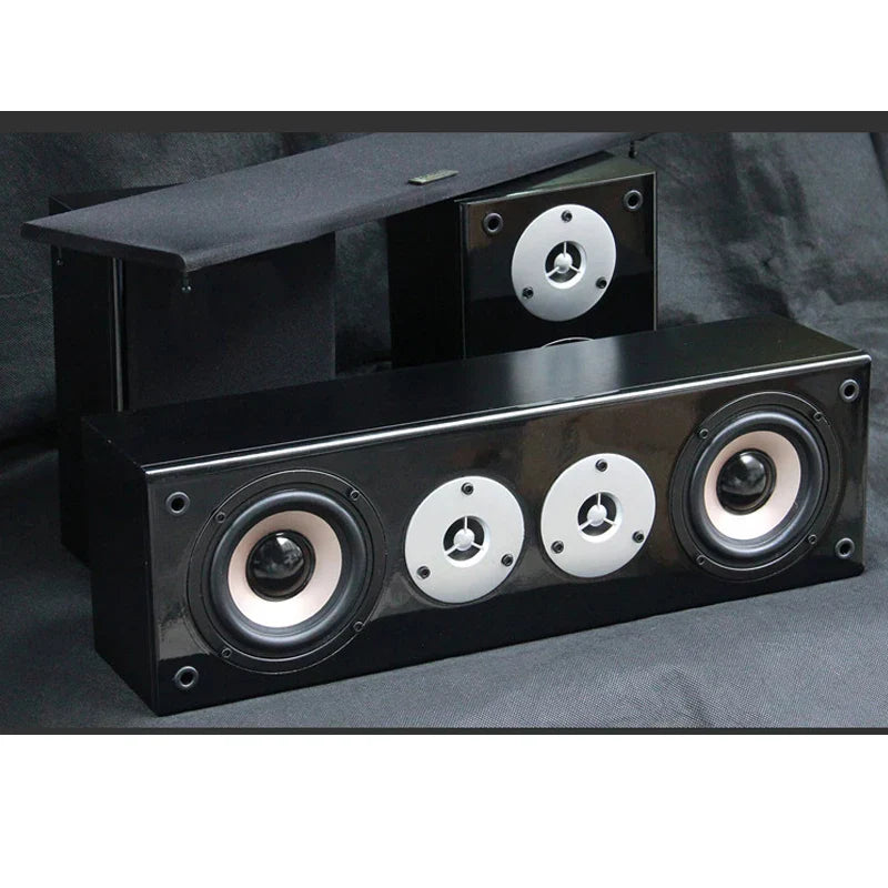 Black glossy 4 inch high power center surround speaker with white circular grilles for wall mount home theater use