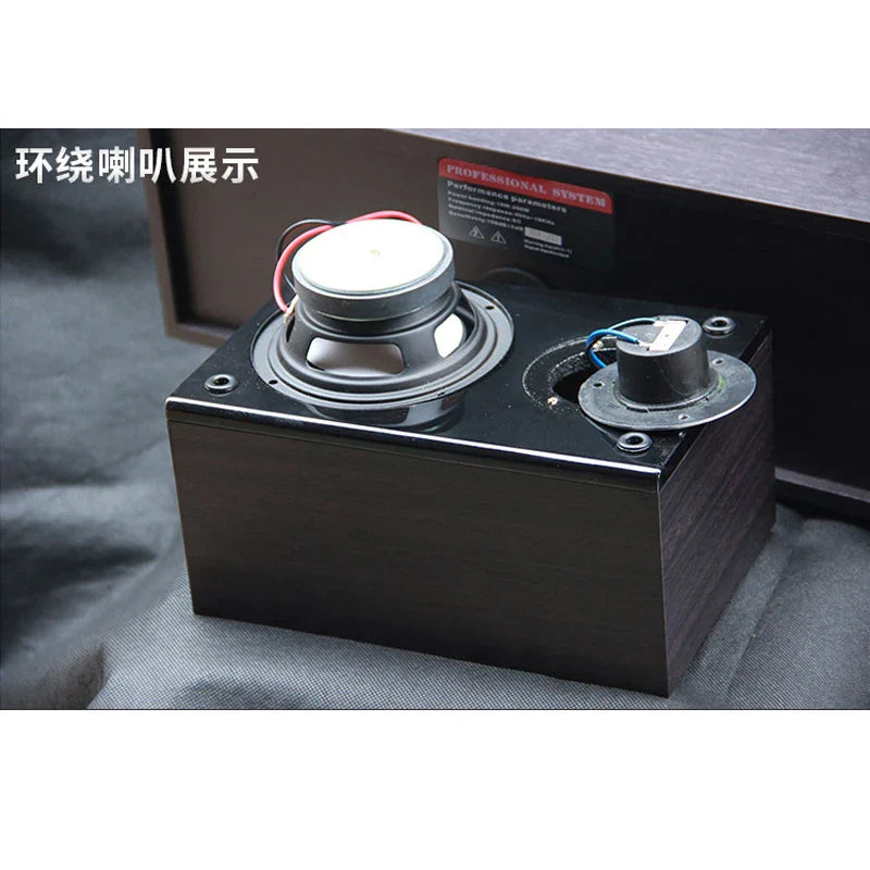 Black rectangular 4 inch high power center surround speaker with metallic woofer and tweeter for wall mount use