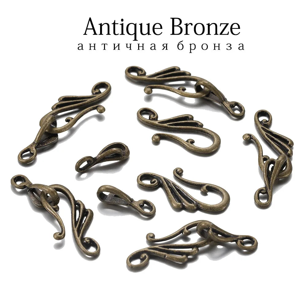 Antique bronze metal clasps with intricate swirling scrollwork from 10sets antique musical note toggle jewelry findings making kit