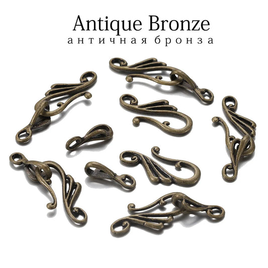 Antique bronze metal clasps with intricate swirling scrollwork from 10sets antique musical note toggle jewelry findings making kit
