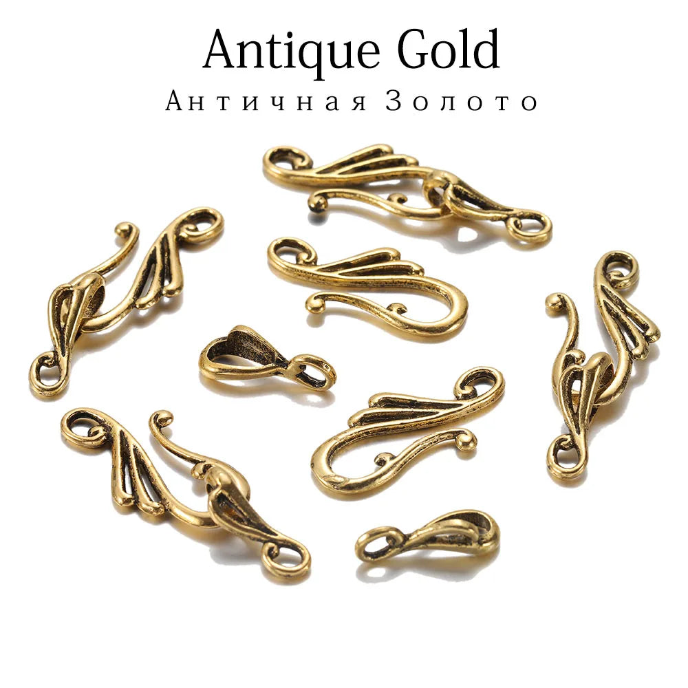 Antique gold-toned metal musical note toggle clasps with intricate scrollwork for jewelry findings making pendants accessories