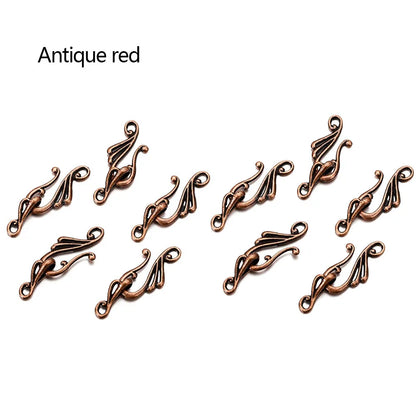 Antique red metal filigree connectors with ornate swirling designs for 10sets antique musical jewelry findings making
