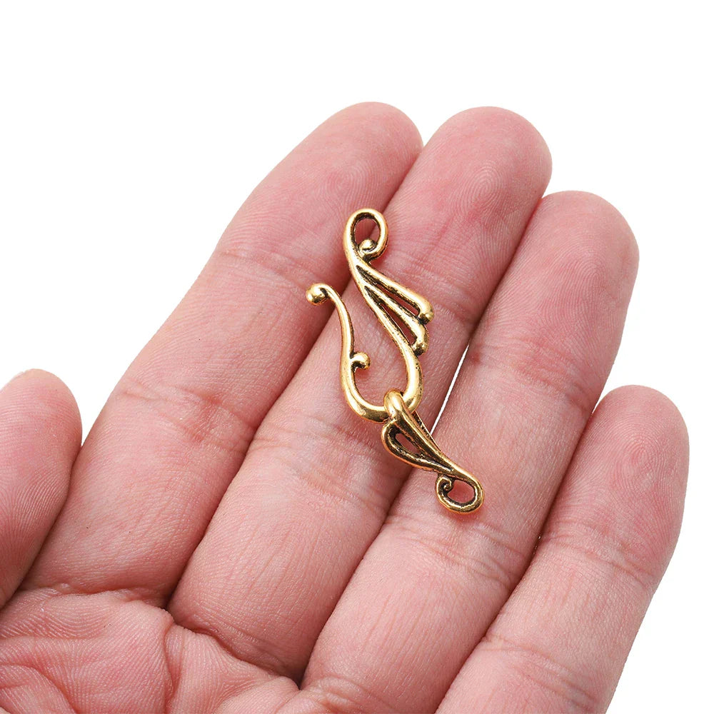 Gold-toned metal 10sets antique musical note toggle clasp with intricate swirling design for jewelry findings making