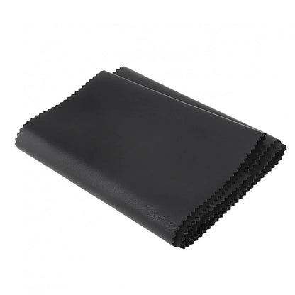 Black faux leather piano keyboard dust cover with textured surface and serrated edges for keys upright pianos