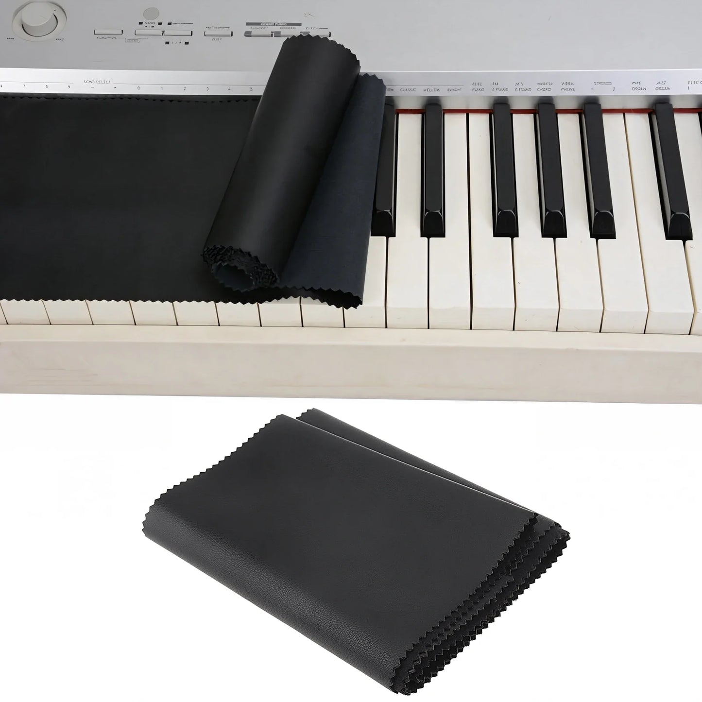 Black microfiber piano key cleaning cloth neatly folded beside a piano keyboard dust cover for keys upright pianos