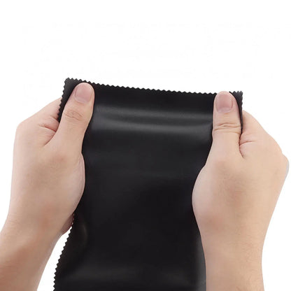 Black soft-textured microfiber cleaning cloth with serrated edge for piano keyboard dust protection on keys upright pianos