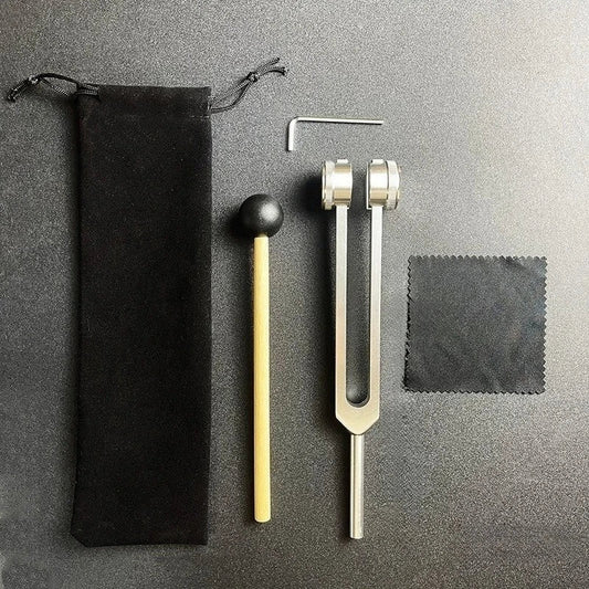 Silver-toned 128 hz tuning fork with polished metallic finish and wooden mallet for yoga meditation healing group therapy accessory
